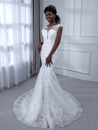 Robes de mariée sirène en tulle sans manches à col transparent avec appliques